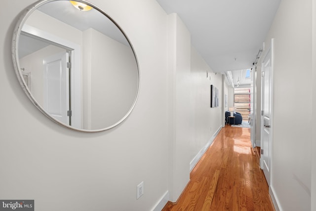 1390 Kenyon St NW Unit 524, Washington, DC 20010 - corridor with light wood-style flooring and baseboards
