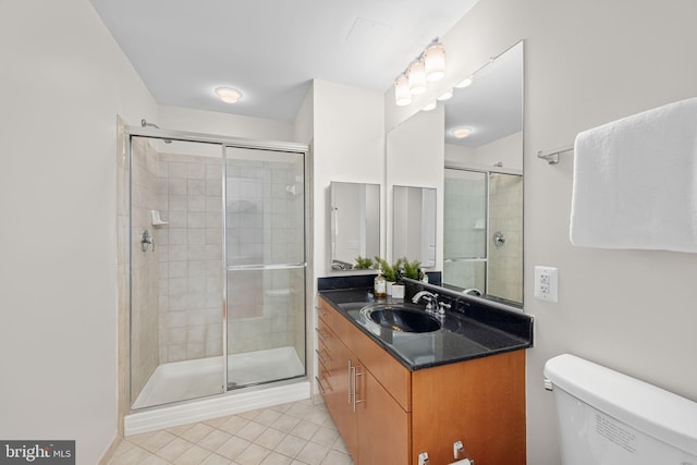 1390 Kenyon St NW Unit 524, Washington, DC 20010 - bathroom with tile patterned floors, a shower stall, and vanity