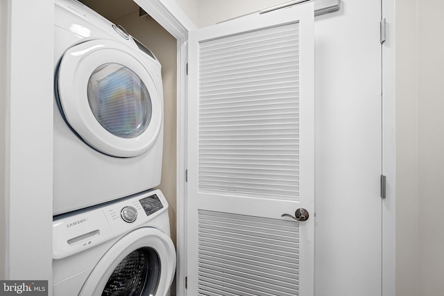 1390 Kenyon St NW Unit 524, Washington, DC 20010 - laundry area featuring stacked washer and clothes dryer