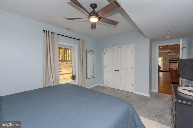 130 Wisp Adventure Rd, Mc Henry, MD 21541 - carpeted bedroom featuring multiple windows, a closet, and ceiling fan