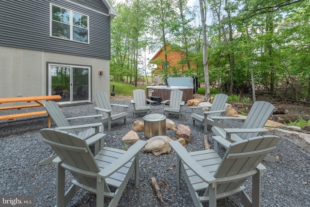 130 Wisp Adventure Rd, Mc Henry, MD 21541 - view of patio featuring an outdoor fire pit and a hot tub