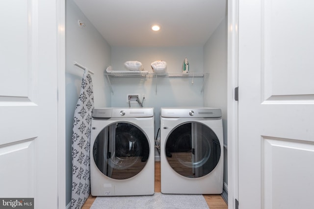 130 Wisp Adventure Rd, Mc Henry, MD 21541 - laundry area featuring washing machine and clothes dryer, light wood finished floors, and recessed lighting