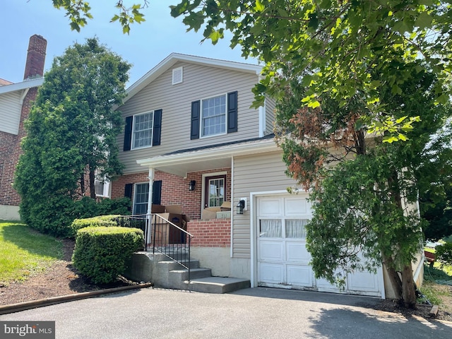 711 E Cork St, Winchester, VA 22601 - view of front of house featuring brick siding