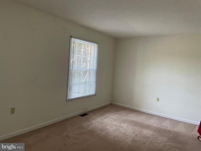 711 E Cork St, Winchester, VA 22601 - carpeted empty room featuring baseboards