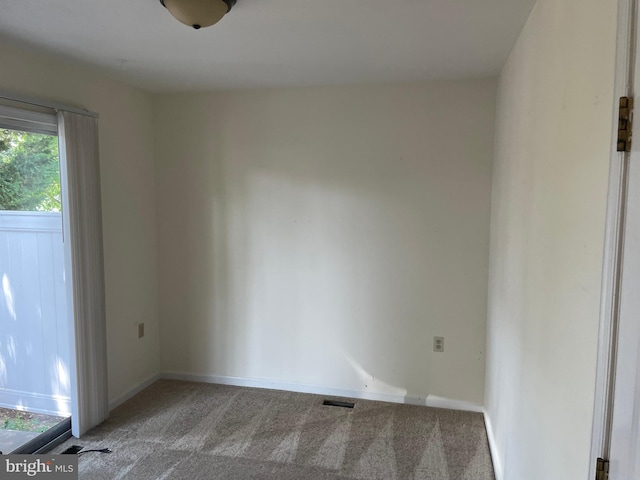 711 E Cork St, Winchester, VA 22601 - unfurnished room featuring light colored carpet and baseboards