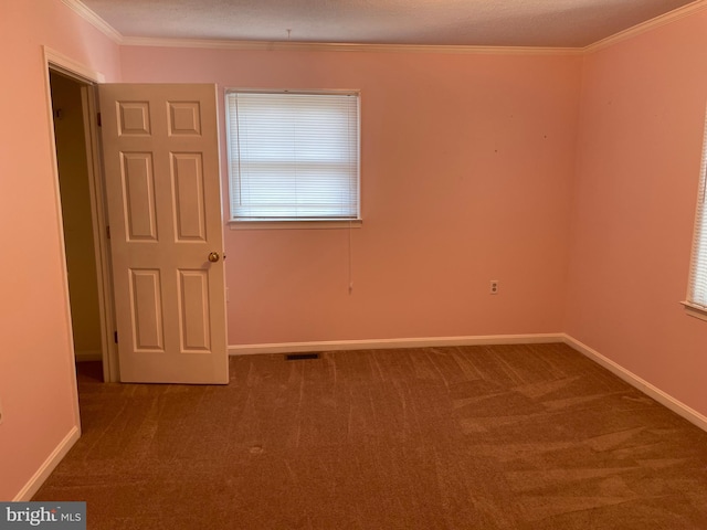 711 E Cork St, Winchester, VA 22601 - unfurnished room featuring carpet, ornamental molding, and healthy amount of natural light