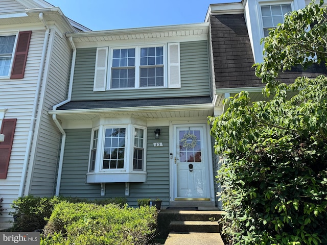 43 Southall Ct, Sterling, VA 20165 - view of exterior entry featuring roof with shingles