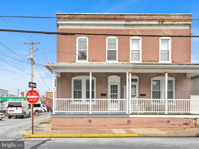 3 S Pine St, Middletown, PA 17057 - townhome / multi-family property with covered porch and brick siding