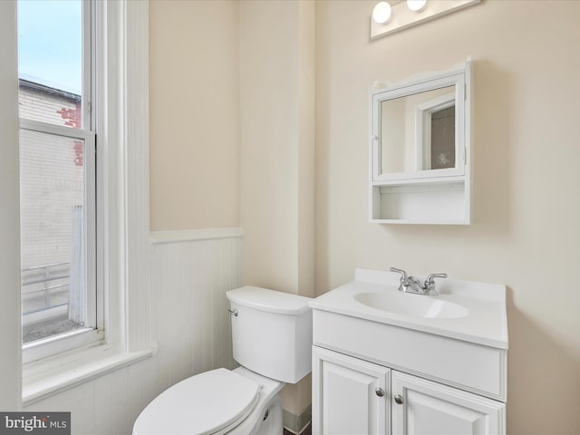3 S Pine St, Middletown, PA 17057 - bathroom with vanity, a wainscoted wall, and wood walls