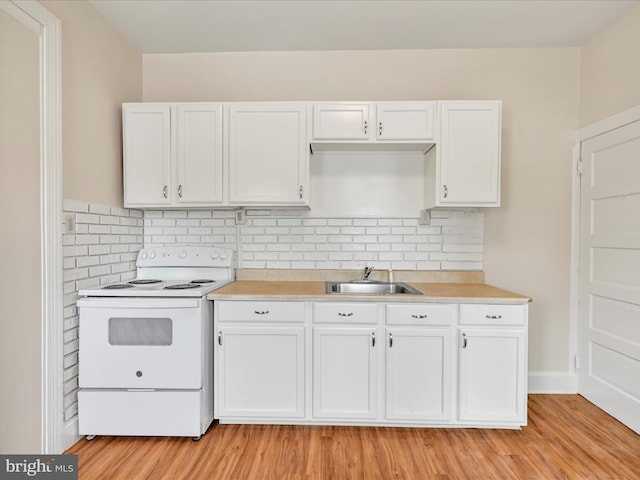 3 S Pine St, Middletown, PA 17057 - kitchen with white electric range oven, light countertops, white cabinetry, and light wood-type flooring