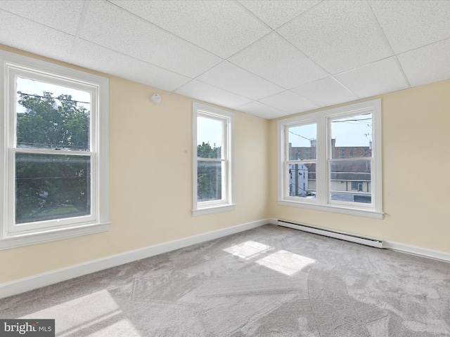 3 S Pine St, Middletown, PA 17057 - unfurnished room with a baseboard radiator, a paneled ceiling, carpet flooring, and healthy amount of natural light