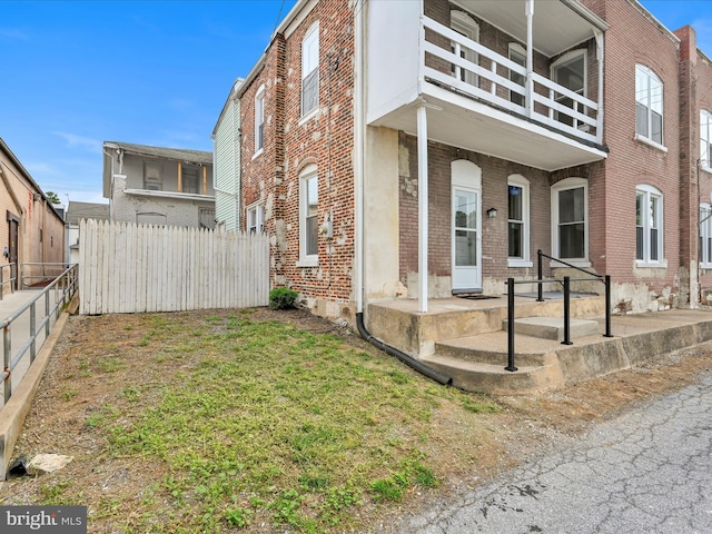 3 S Pine St, Middletown, PA 17057 - view of side of property with brick siding and a balcony