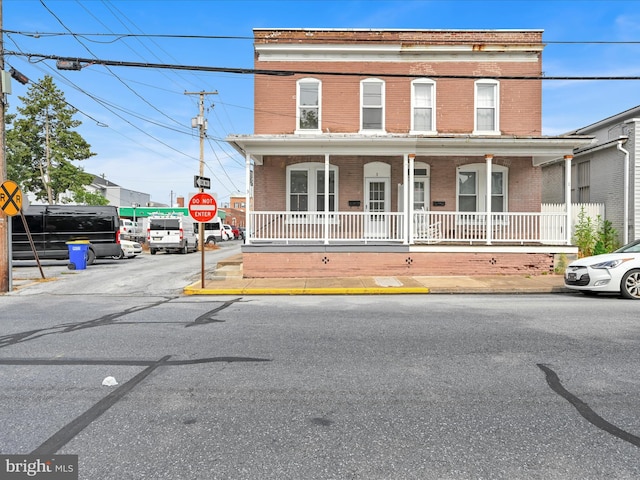 3 S Pine St, Middletown, PA 17057 - townhome / multi-family property featuring brick siding and a porch