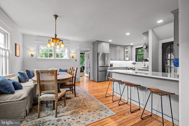 201 Locust St, Moorestown, NJ 08057 - dining space featuring light wood-style floors, a chandelier, and recessed lighting
