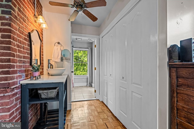 201 Locust St, Moorestown, NJ 08057 - foyer entrance featuring a ceiling fan and brick wall