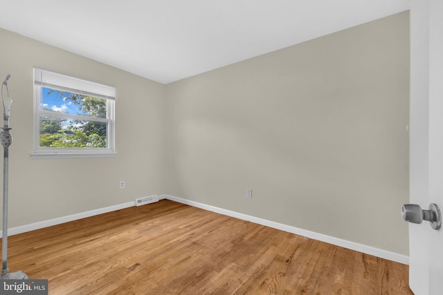 8000 Dellwood Ave, Glenarden, MD 20706 - spare room featuring baseboards and light wood-style flooring