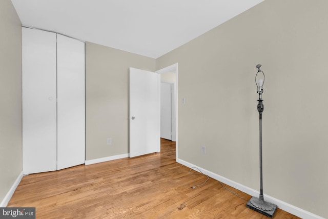 8000 Dellwood Ave, Glenarden, MD 20706 - unfurnished bedroom with light wood-style floors and a closet