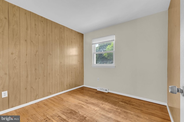8000 Dellwood Ave, Glenarden, MD 20706 - spare room with wood finished floors and baseboards