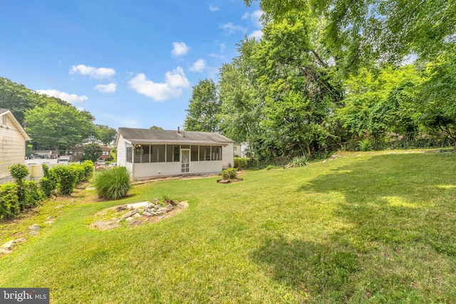 8000 Dellwood Ave, Glenarden, MD 20706 - view of grassy yard with a sunroom