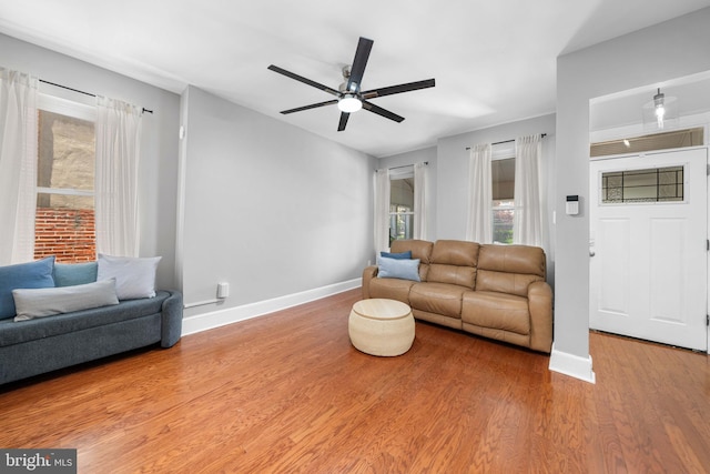 1002 W 9th St, Wilmington, DE 19806 - living room featuring wood finished floors and ceiling fan