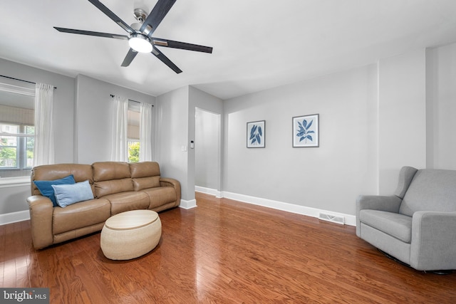 1002 W 9th St, Wilmington, DE 19806 - living area with wood finished floors and a ceiling fan