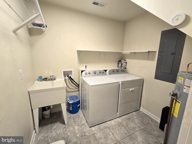 14722 Banks Odee Rd, Newburg, MD 20664 - washroom featuring electric panel, washing machine and clothes dryer, and water heater
