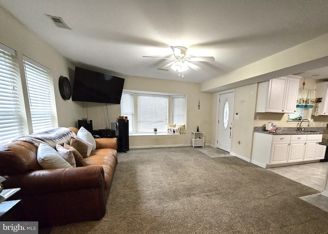 14722 Banks Odee Rd, Newburg, MD 20664 - living room featuring light carpet and a ceiling fan