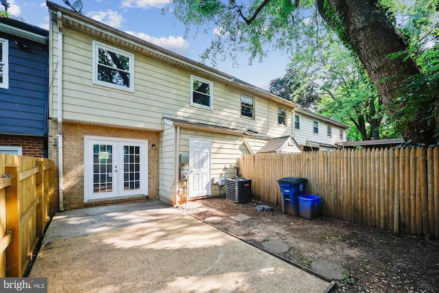 8440 Towne Crest Ct, Gaithersburg, MD 20877 - back of house with a fenced backyard, a patio, french doors, and brick siding
