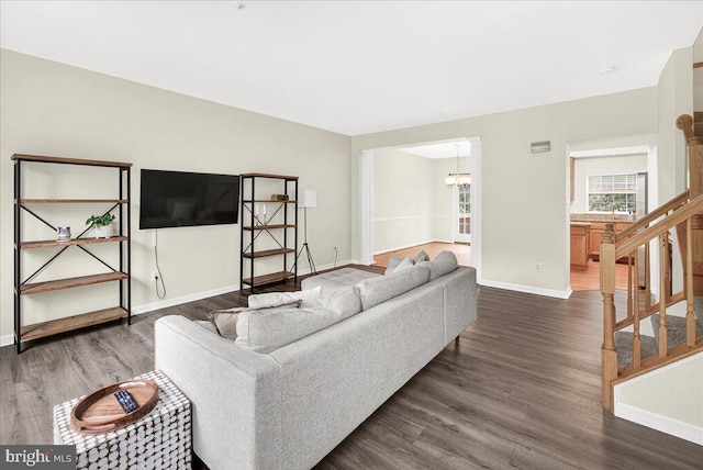 13102 Alpine Dr Unit 2502, Germantown, MD 20874 - living room with dark wood-type flooring, stairway, and a chandelier