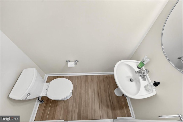13102 Alpine Dr Unit 2502, Germantown, MD 20874 - half bath with wood finished floors and toilet