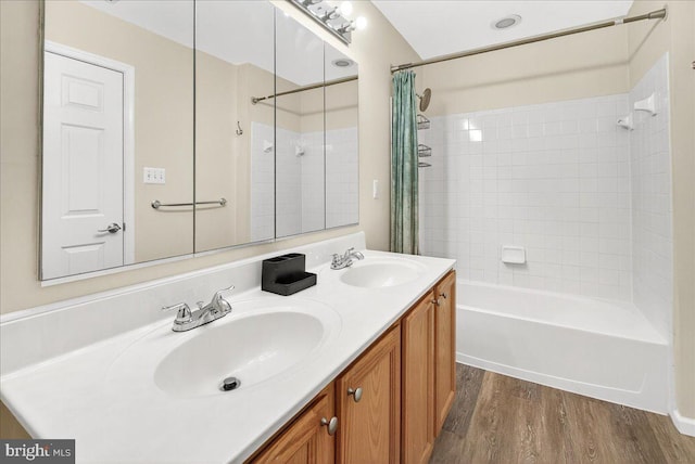 13102 Alpine Dr Unit 2502, Germantown, MD 20874 - bathroom with wood finished floors, shower / bath combo with shower curtain, and double vanity