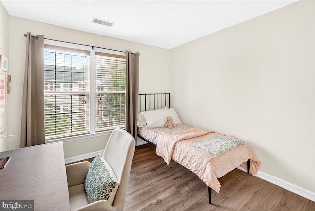 13102 Alpine Dr Unit 2502, Germantown, MD 20874 - bedroom with multiple windows and wood finished floors