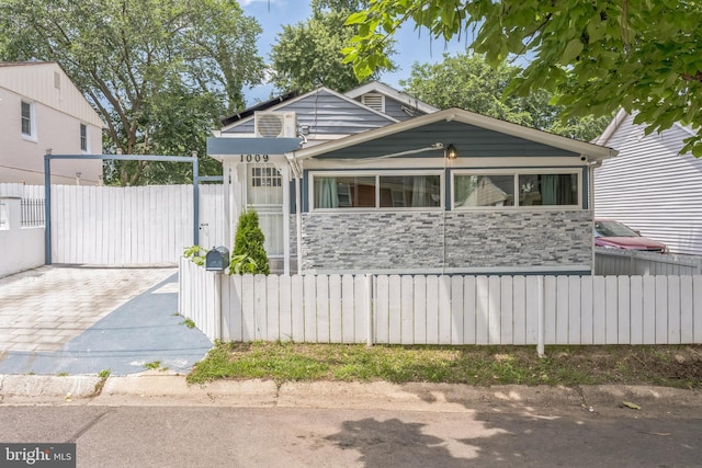 1009 Jansen Ave, Capitol Heights, MD 20743 - bungalow featuring stone siding