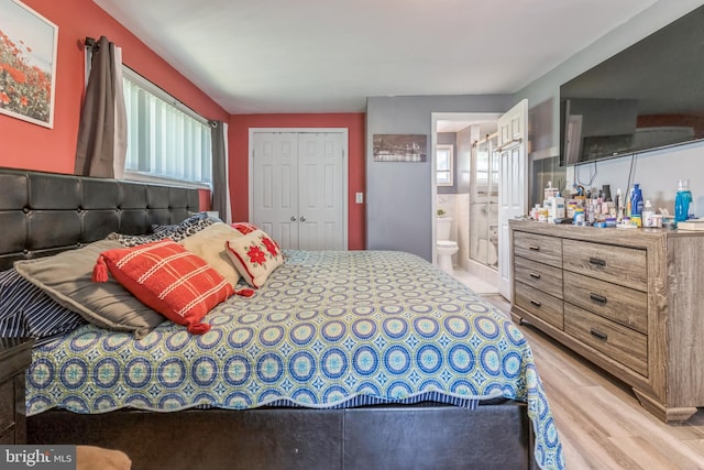 1009 Jansen Ave, Capitol Heights, MD 20743 - bedroom with multiple windows, wood finished floors, and a closet