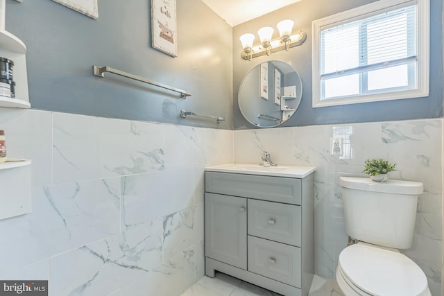 1009 Jansen Ave, Capitol Heights, MD 20743 - half bathroom with tile walls, vanity, and wainscoting