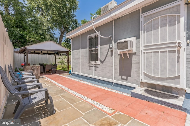 1009 Jansen Ave, Capitol Heights, MD 20743 - view of patio featuring a gazebo and a wall mounted AC