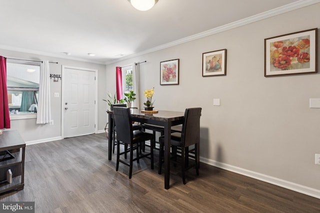 1009 Jansen Ave, Capitol Heights, MD 20743 - dining area with dark wood-style floors and ornamental molding