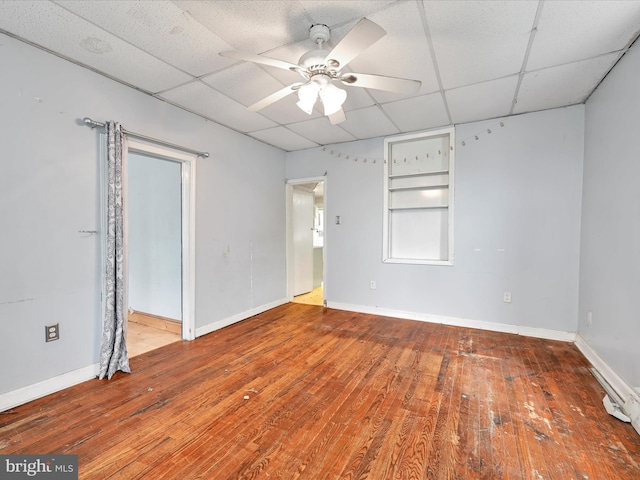 543 W Main Ave, Myerstown, PA 17067 - unfurnished bedroom featuring hardwood / wood-style flooring, a drop ceiling, and ceiling fan