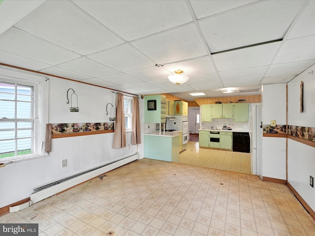 543 W Main Ave, Myerstown, PA 17067 - kitchen with green cabinets, a baseboard heating unit, a paneled ceiling, light countertops, and light flooring