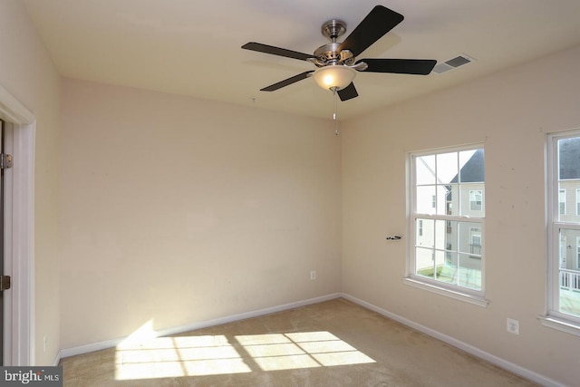 7226 Abbey Rd, Elkridge, MD 21075 - unfurnished room featuring healthy amount of natural light, ceiling fan, and light colored carpet
