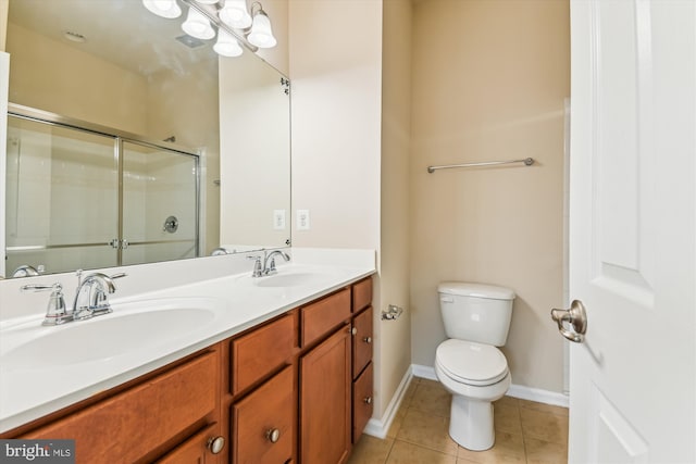 7226 Abbey Rd, Elkridge, MD 21075 - full bath with tile patterned floors, double vanity, and a shower with shower door