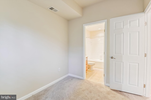 7226 Abbey Rd, Elkridge, MD 21075 - unfurnished bedroom featuring light carpet and connected bathroom