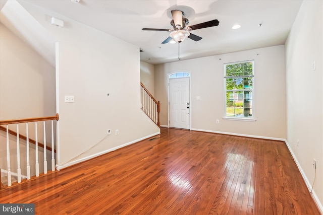 7226 Abbey Rd, Elkridge, MD 21075 - spare room featuring hardwood / wood-style floors, stairs, and a ceiling fan