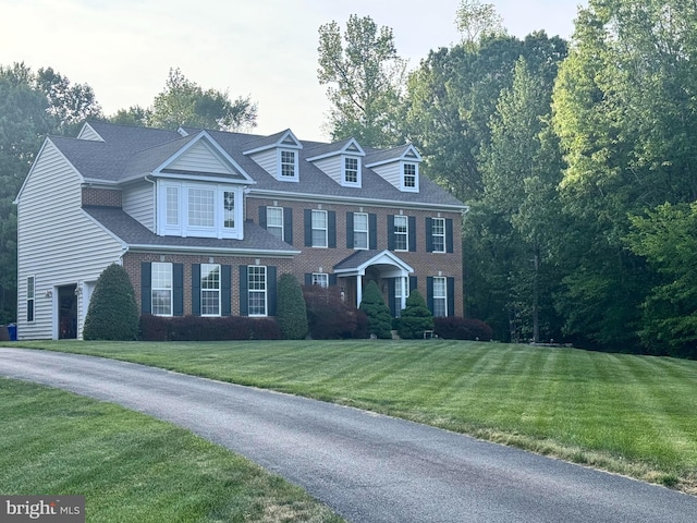 8110 Tiverton Dr, Port Tobacco, MD 20677 - view of front of property with a front yard and brick siding