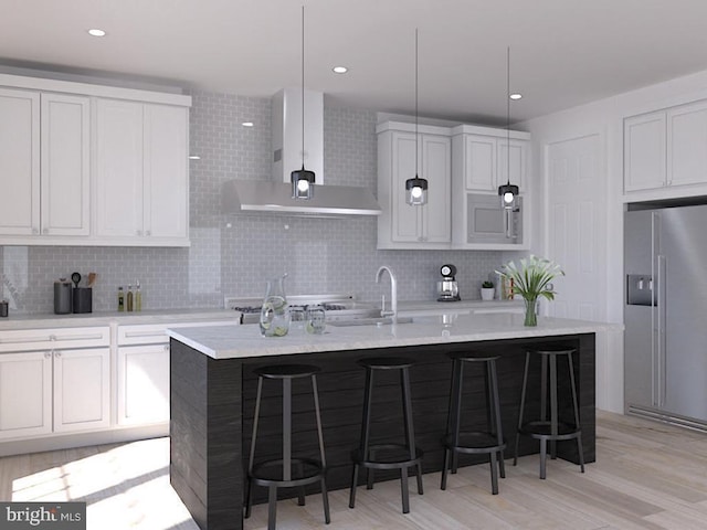 0 Surge Way, Carlisle, PA 17015 - kitchen featuring high end fridge, range hood, a breakfast bar area, and decorative backsplash