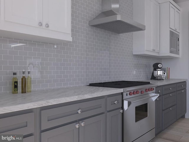 0 Surge Way, Carlisle, PA 17015 - kitchen featuring stainless steel stove, wall chimney exhaust hood, backsplash, and light stone counters