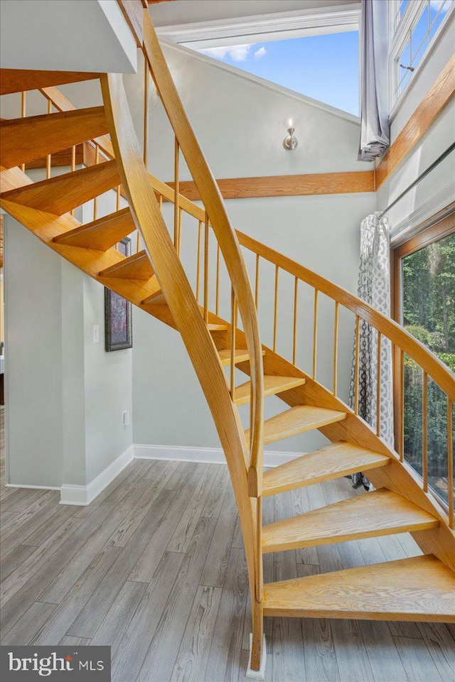194 Harbor Dr, Lusby, MD 20657 - stairs featuring wood finished floors
