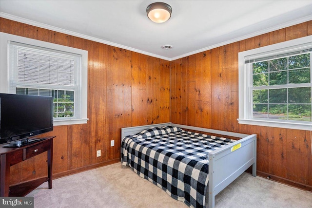 194 Harbor Dr, Lusby, MD 20657 - carpeted bedroom with wood walls and crown molding