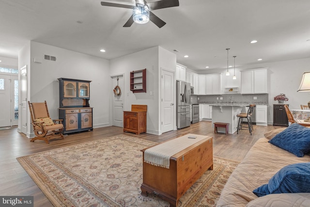 612 Cypress Dr Unit 51, Hanover, PA 17331 - living room with ceiling fan, light wood-style floors, and recessed lighting