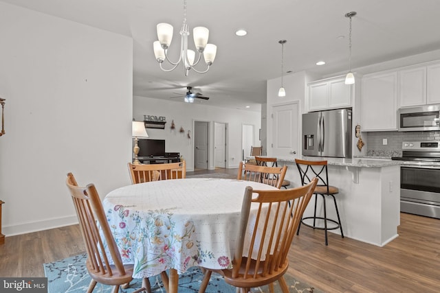 612 Cypress Dr Unit 51, Hanover, PA 17331 - dining space featuring a ceiling fan, wood finished floors, a chandelier, and recessed lighting